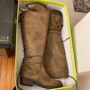 NEW IN BOX!  Brown lace back boots with 1 inch heel.